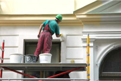 carpenter fixing a window